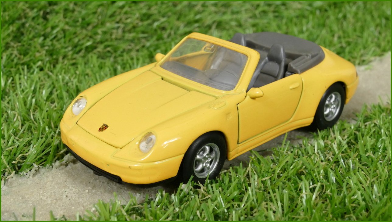 Model Autíčka Welly 1:34 - Porsche 911 Carrera Cabriolet No.49722