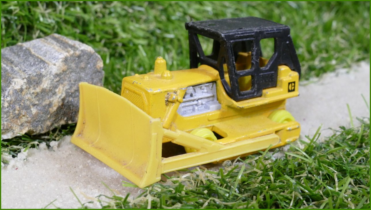 Matchbox Autíčko Angličák (Macau) Caterpillar - bez pásů