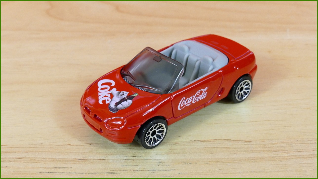Matchbox Autíčko (Made in China) No.2 - Coca-Cola MGF 1.8i - 50th Anniversary