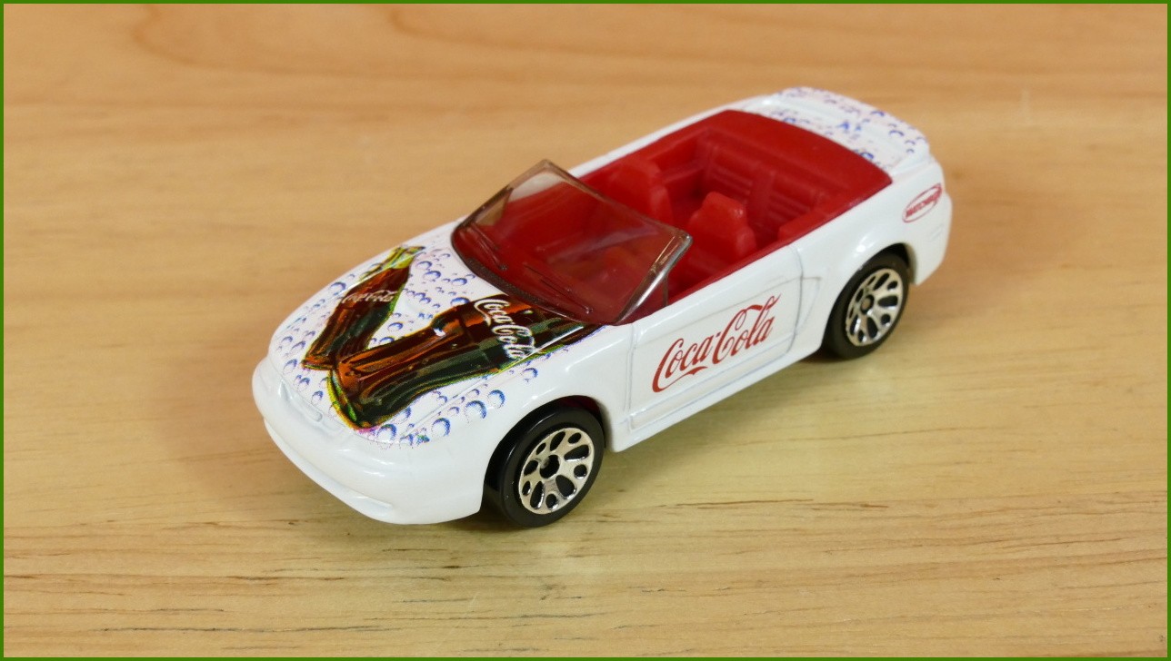 Matchbox Autíčko (Made in China) No.4 - Coca-Cola - ´99 Mustang - 50th Anniversary