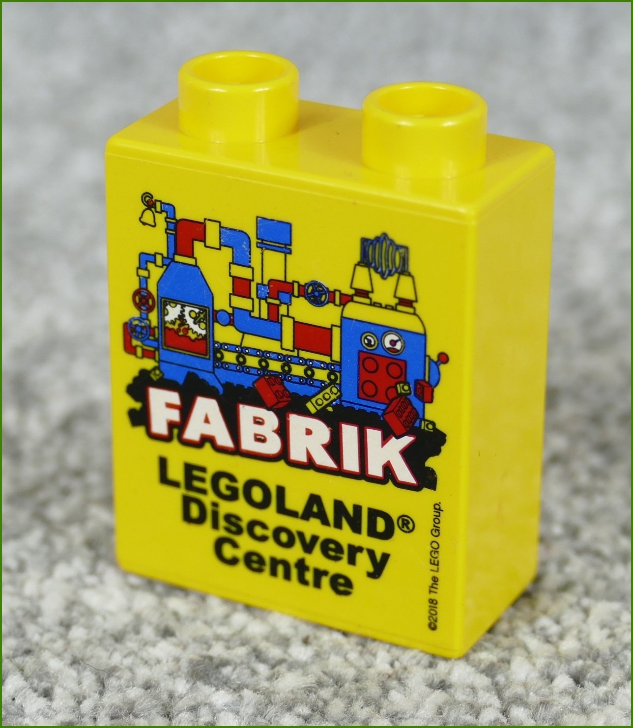 Lego® Duplo® Kostka 1x2x2 Žlutá - Fabrik Legoland 2018