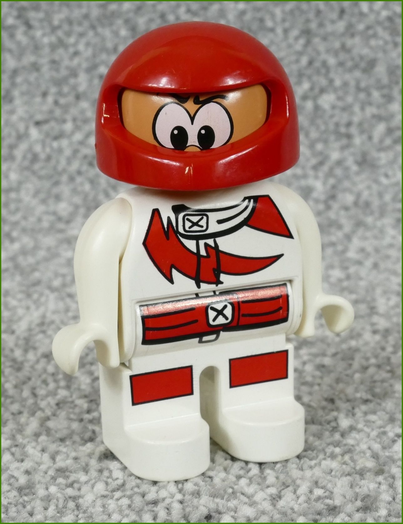 Lego® Duplo® Figurka Závodník v Bílém - Červená Helma