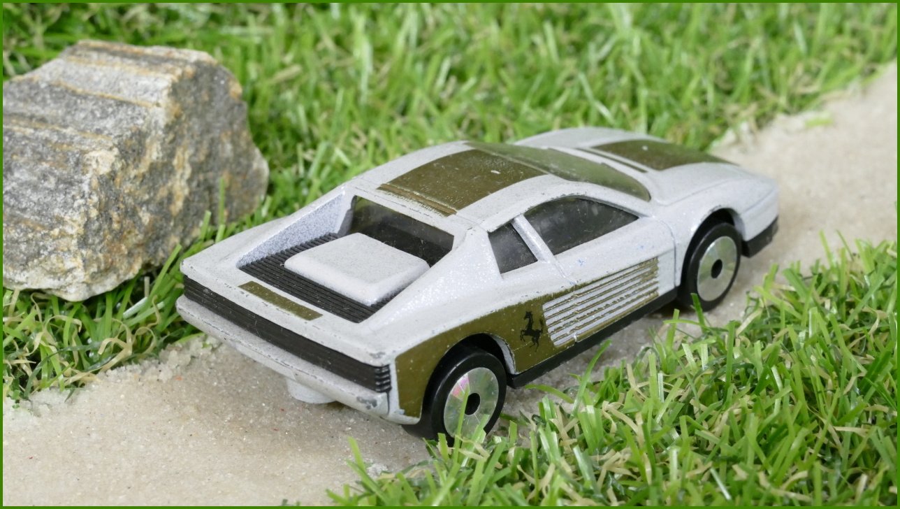 Autíčko Matchbox Ferrari Testarossa (Lasers)