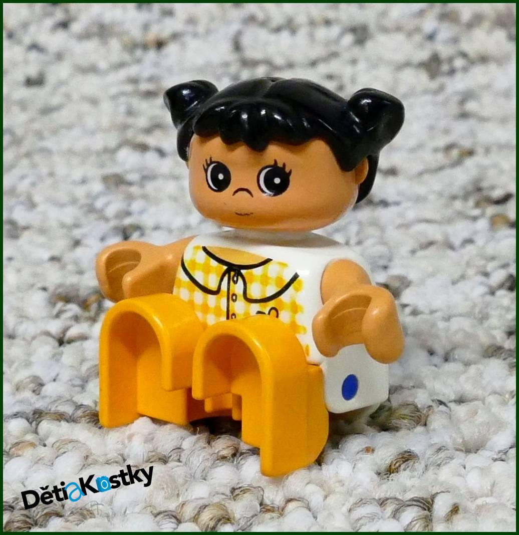 Lego® Duplo® Figurka Dítě Oranžové s Kytičkou