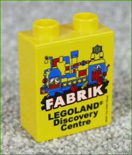 Lego® Duplo® Kostka 1x2x2 Žlutá - Fabrik Legoland 2017