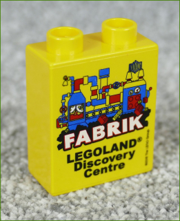 Lego® Duplo® Kostka 1x2x2 Žlutá - Fabrik Legoland 2018
