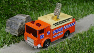 Autíčko Matchbox Mack Auxiliary Power Truck