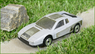 Autíčko Matchbox Ferrari Testarossa (Lasers)