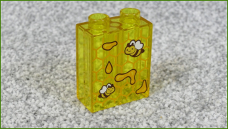 Lego® Duplo® Kostka 1x2x2 Průhledná Světle Oranžová s Potiskem Pláství a Včeliček - Nová